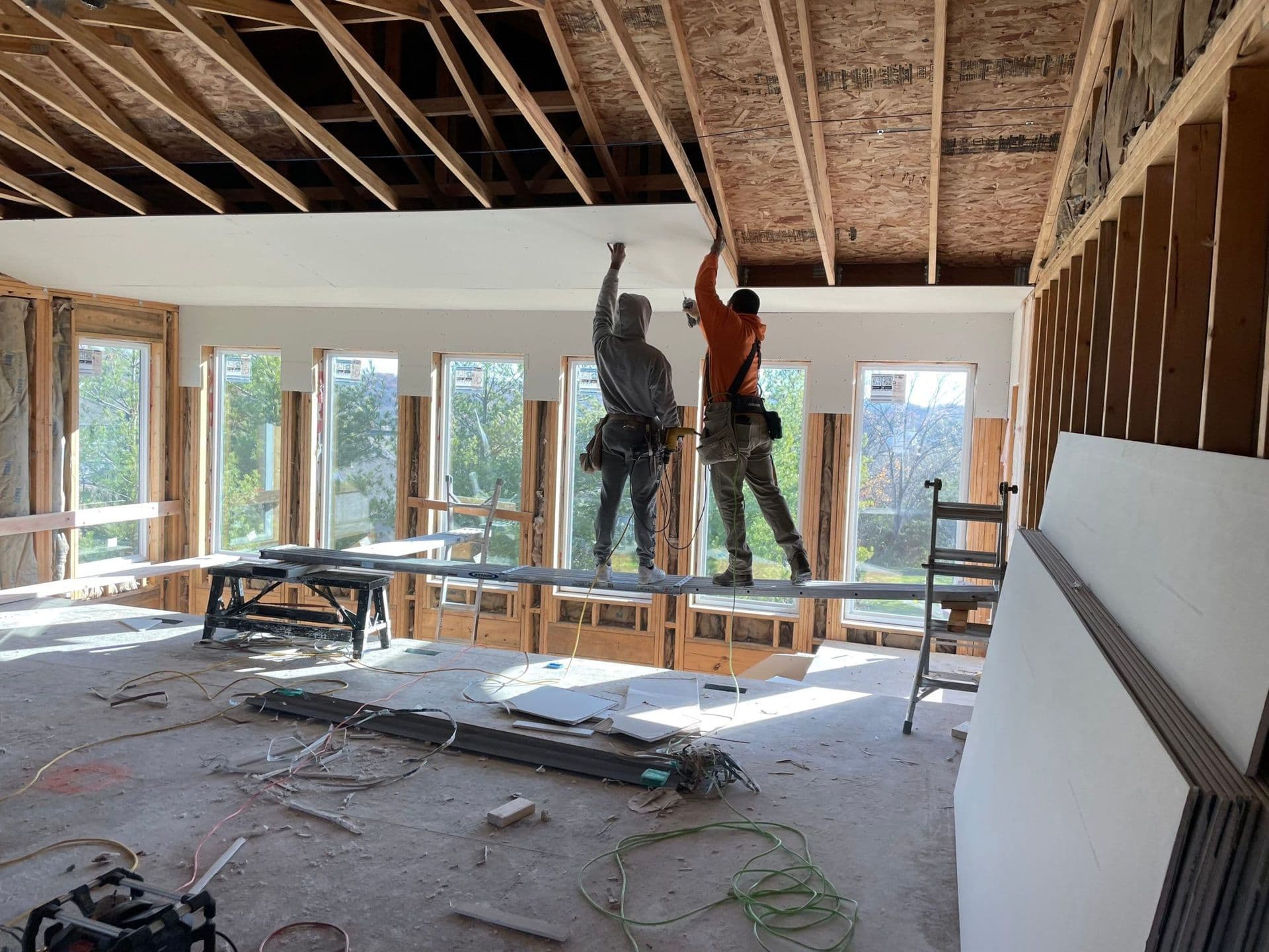 Workers Installing Material